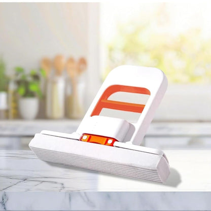 Mini self-squeeze desktop mop
